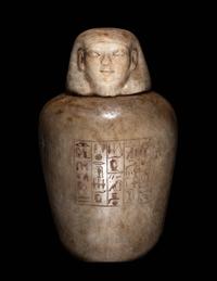 An Egyptian Alabaster Canopic Jar