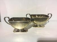 A Victorian Silver Creamer & Sugar Set, Retailed by I.S. Greenberg & Co., Birmingham, 1859, both raised on rectangular feet with canted