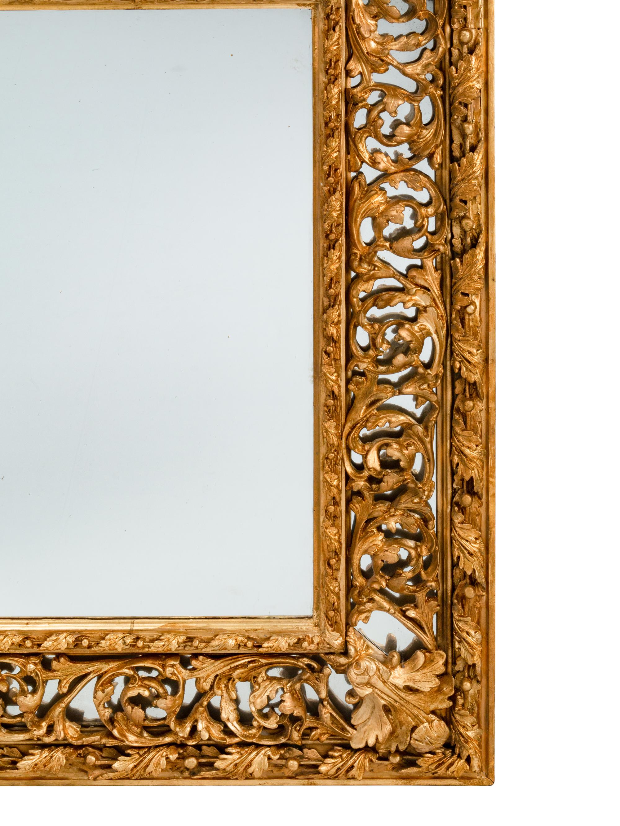 A Pair of Régence Style Giltwood Mirrors