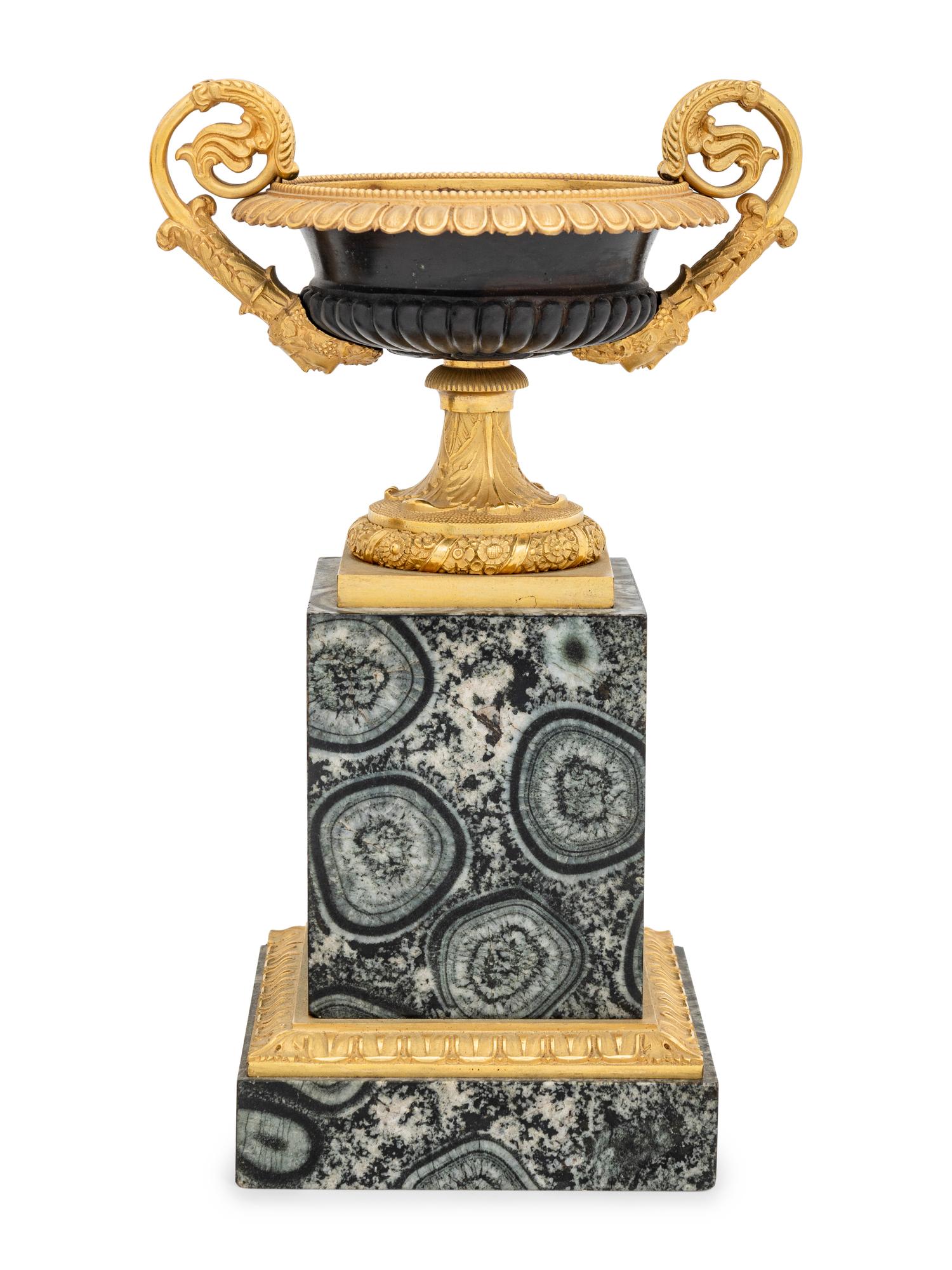 A Pair of Restauration Gilt and Patinated Bronze and Granite Urns