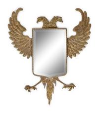 A Continental Pressed Brass Mirror