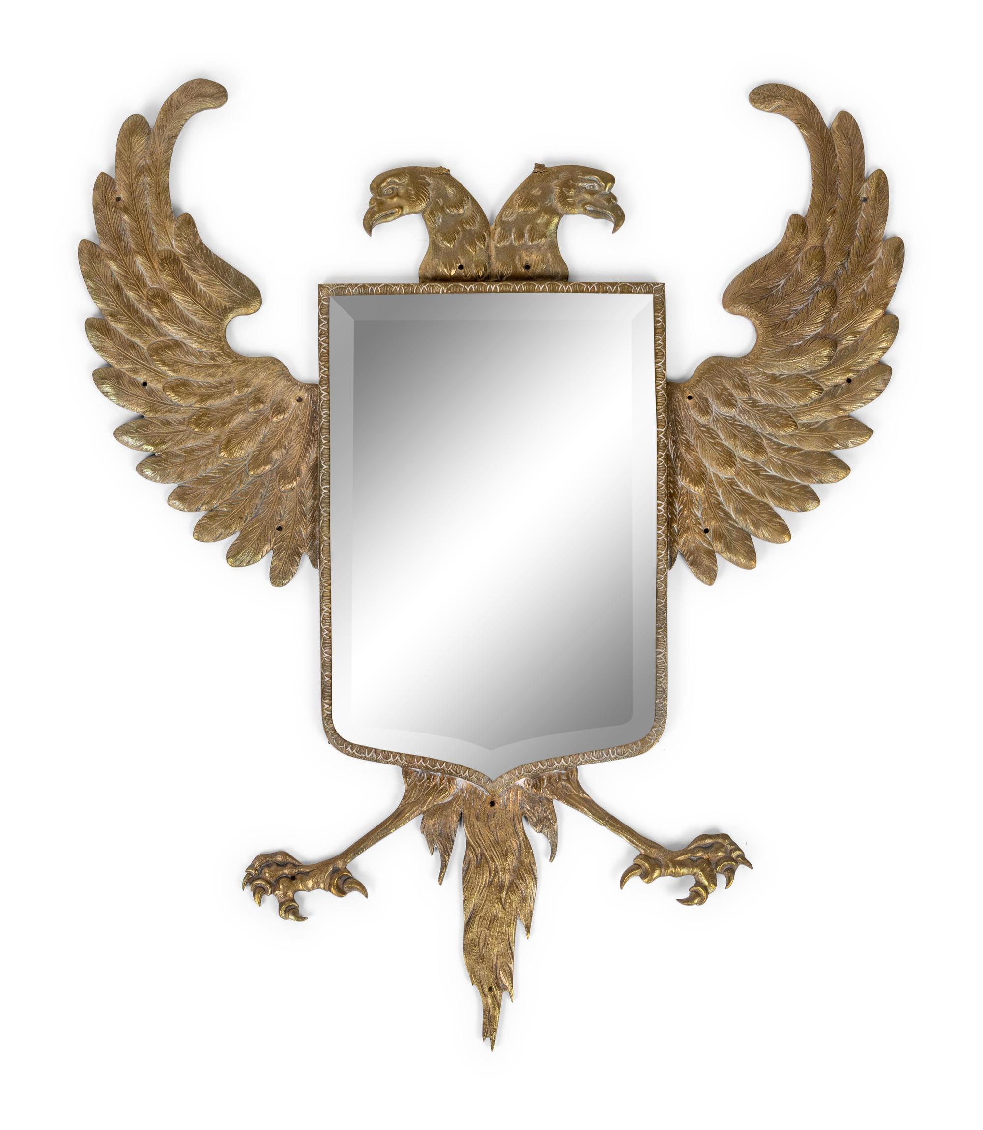 A Continental Pressed Brass Mirror