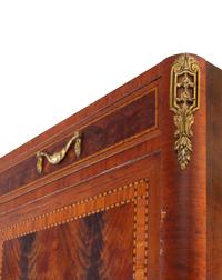 A Louis XVI Style Mahogany Marble-Top Cabinet