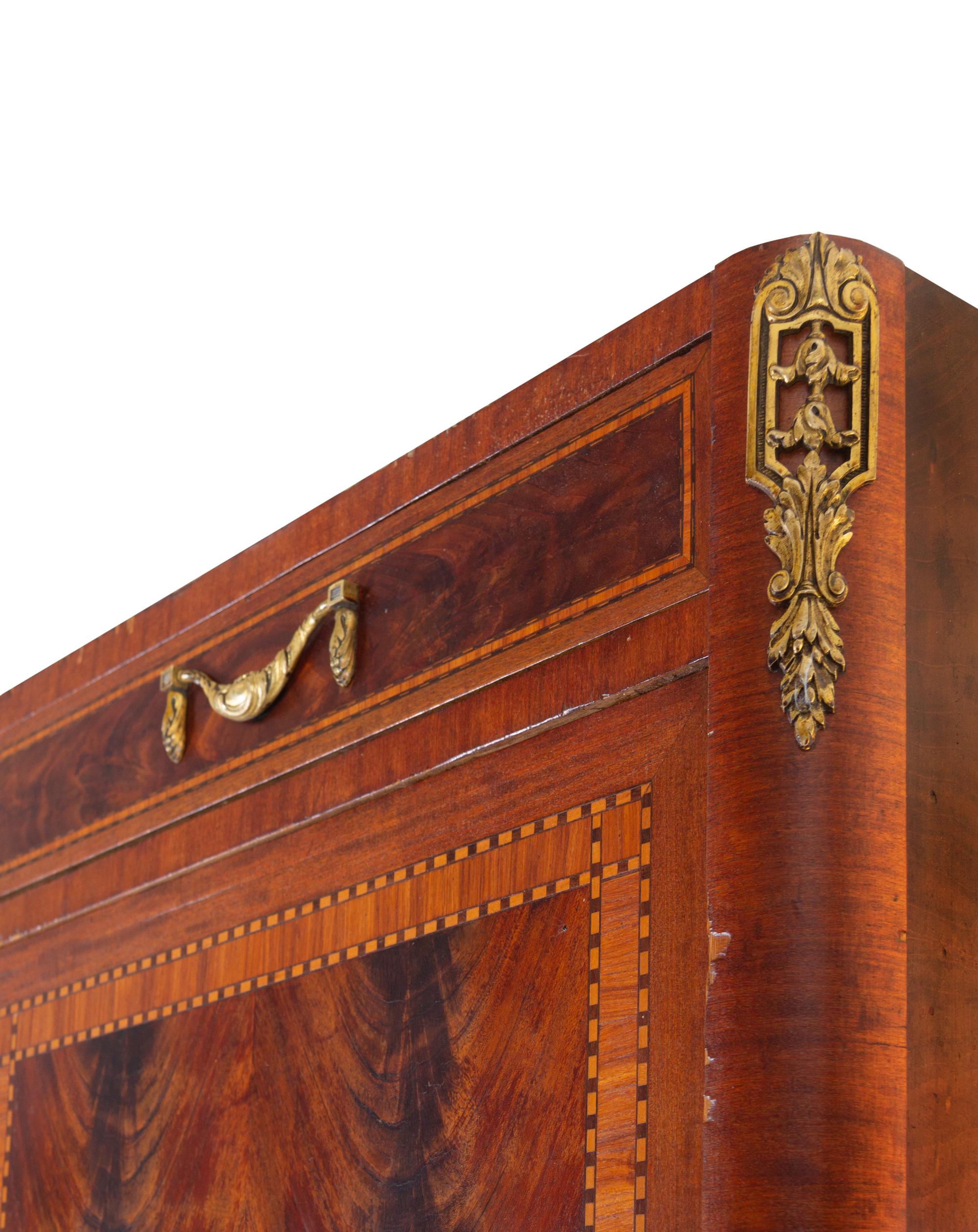 A Louis XVI Style Mahogany Marble-Top Cabinet