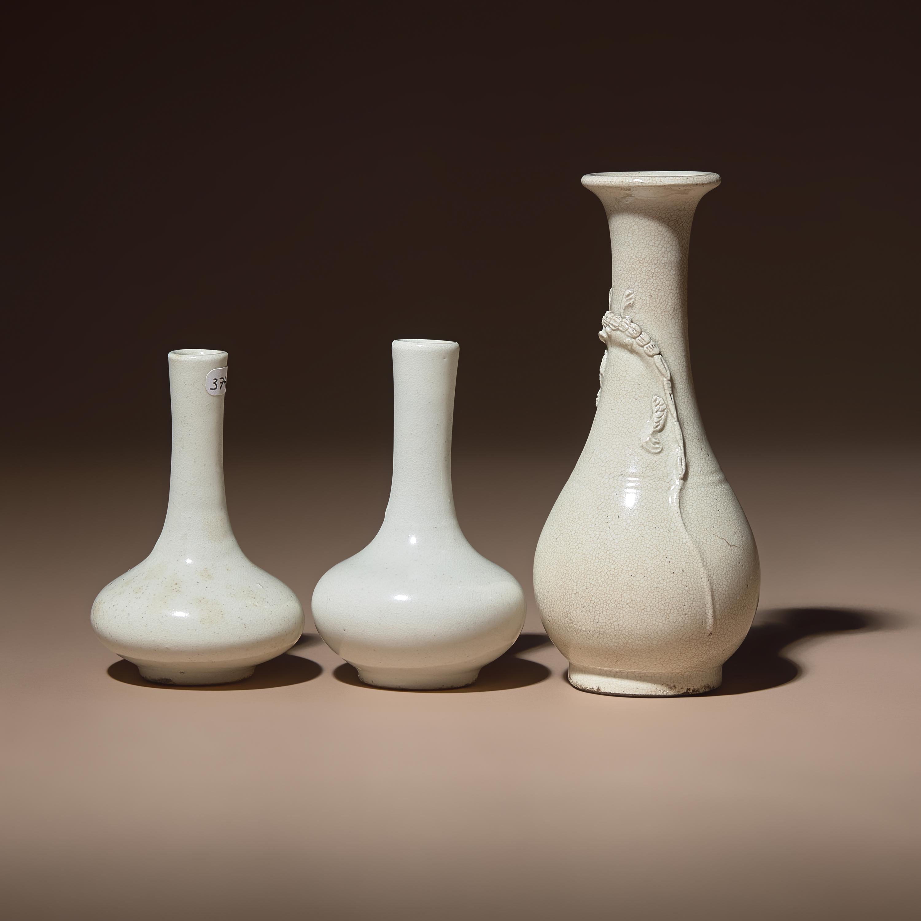Three Small Chinese White Glazed Porcelain Bottle Vases, Qing Dynasty — 清 白瓷瓶三件