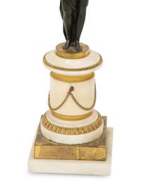 A Pair of French Patinated and Gilt Bronze Figural Three-Light Candelabra