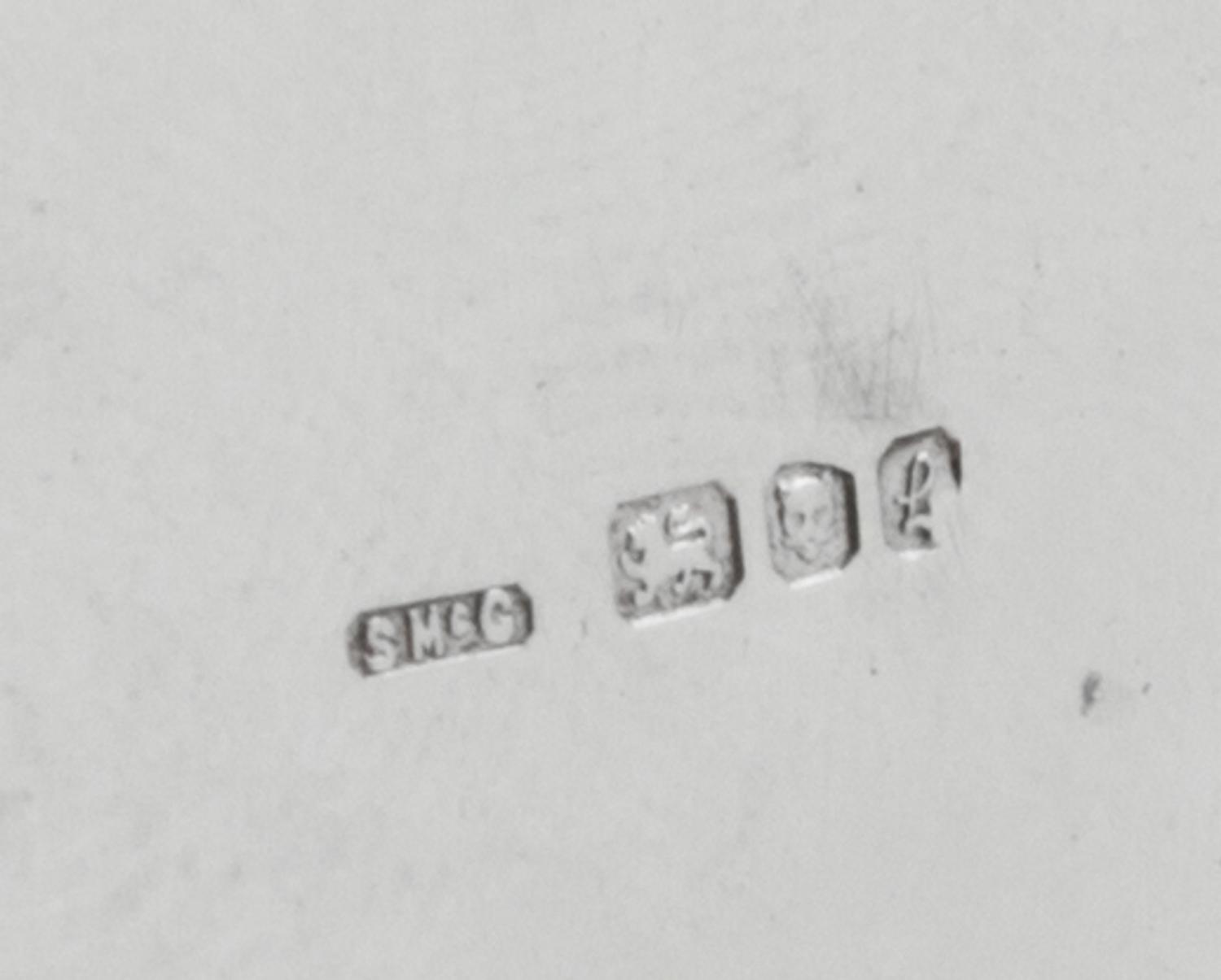 A Group of English Silver Table Articles, Stuart McCabe, London, comprising four teaspoons, four gravy boats, three napkin rings, three