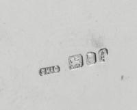 A Group of English Silver Table Articles, Stuart McCabe, London, comprising four teaspoons, four gravy boats, three napkin rings, three