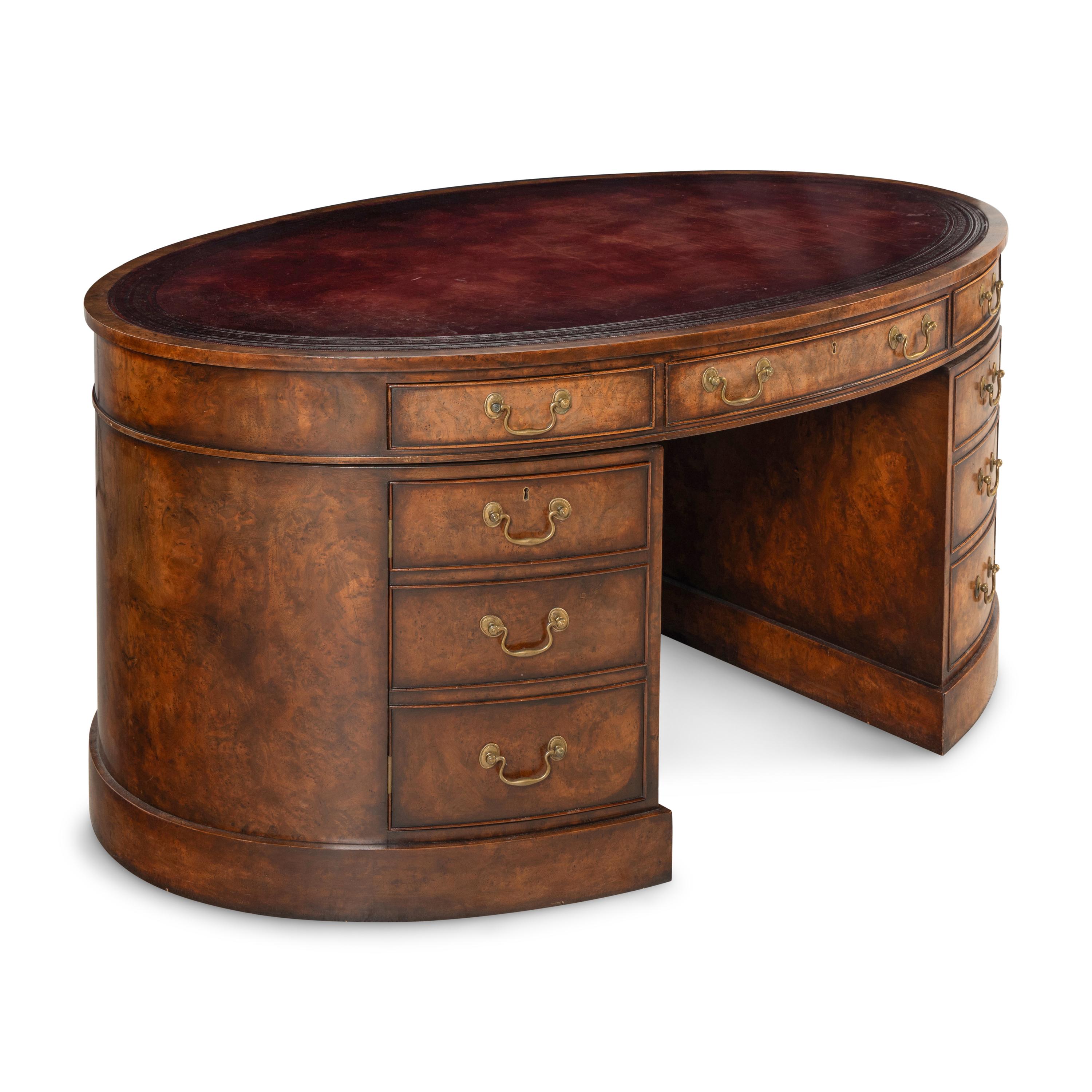 An English Burl Walnut Oval Partners Desk