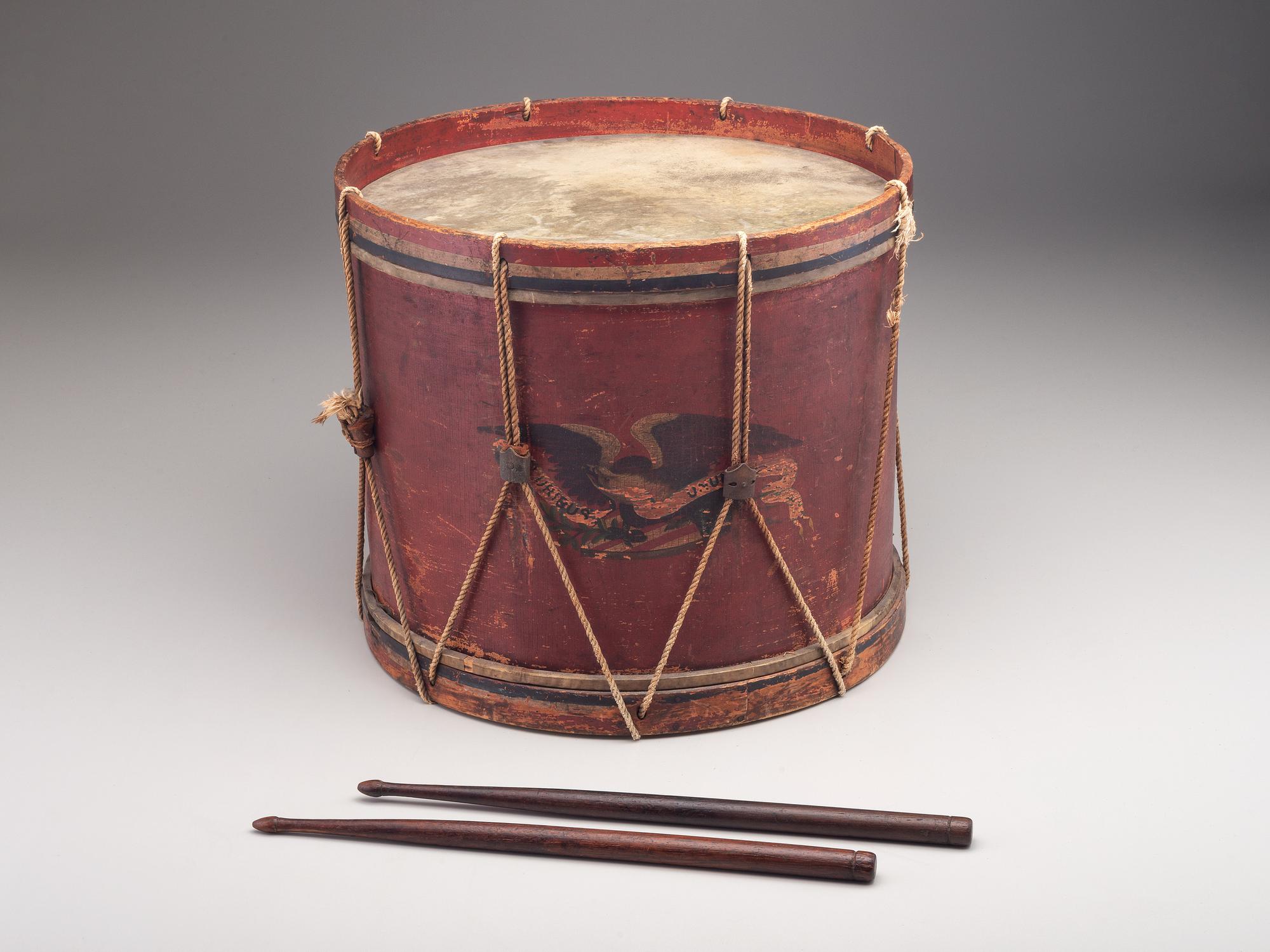 [CIVIL WAR]. E Pluribus Unum red-painted drum featuring eagle motif, with drumsticks.