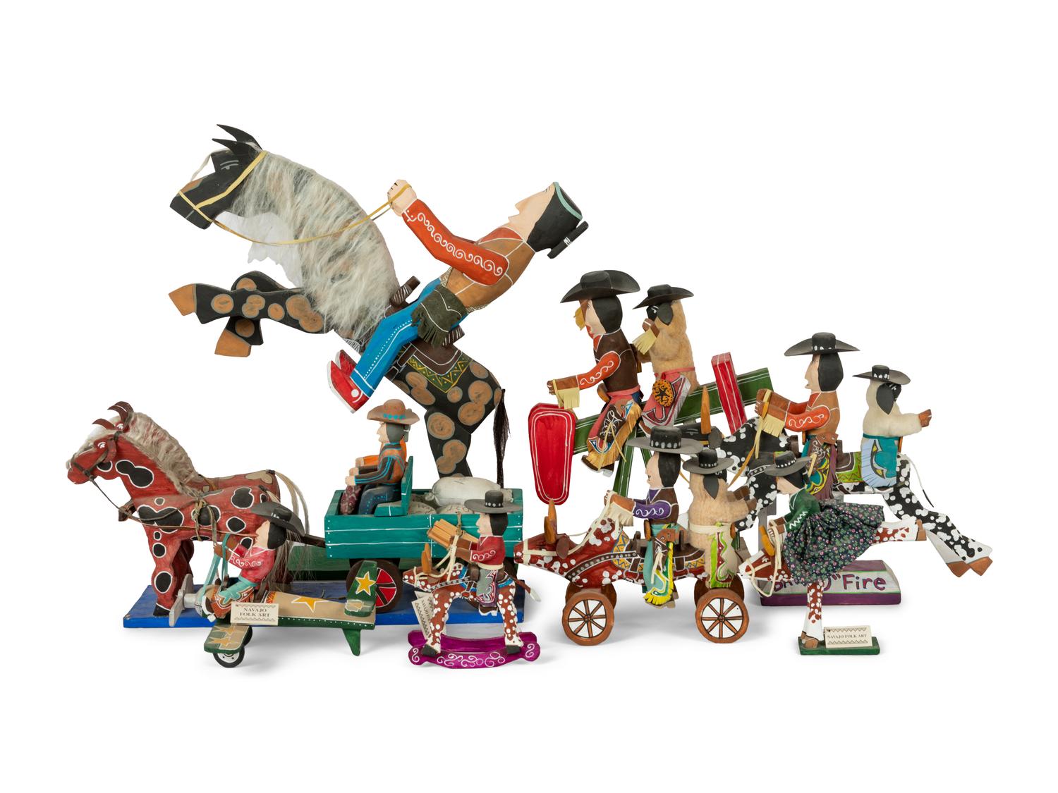 Eight Carved Wood Folk Art Sculptures