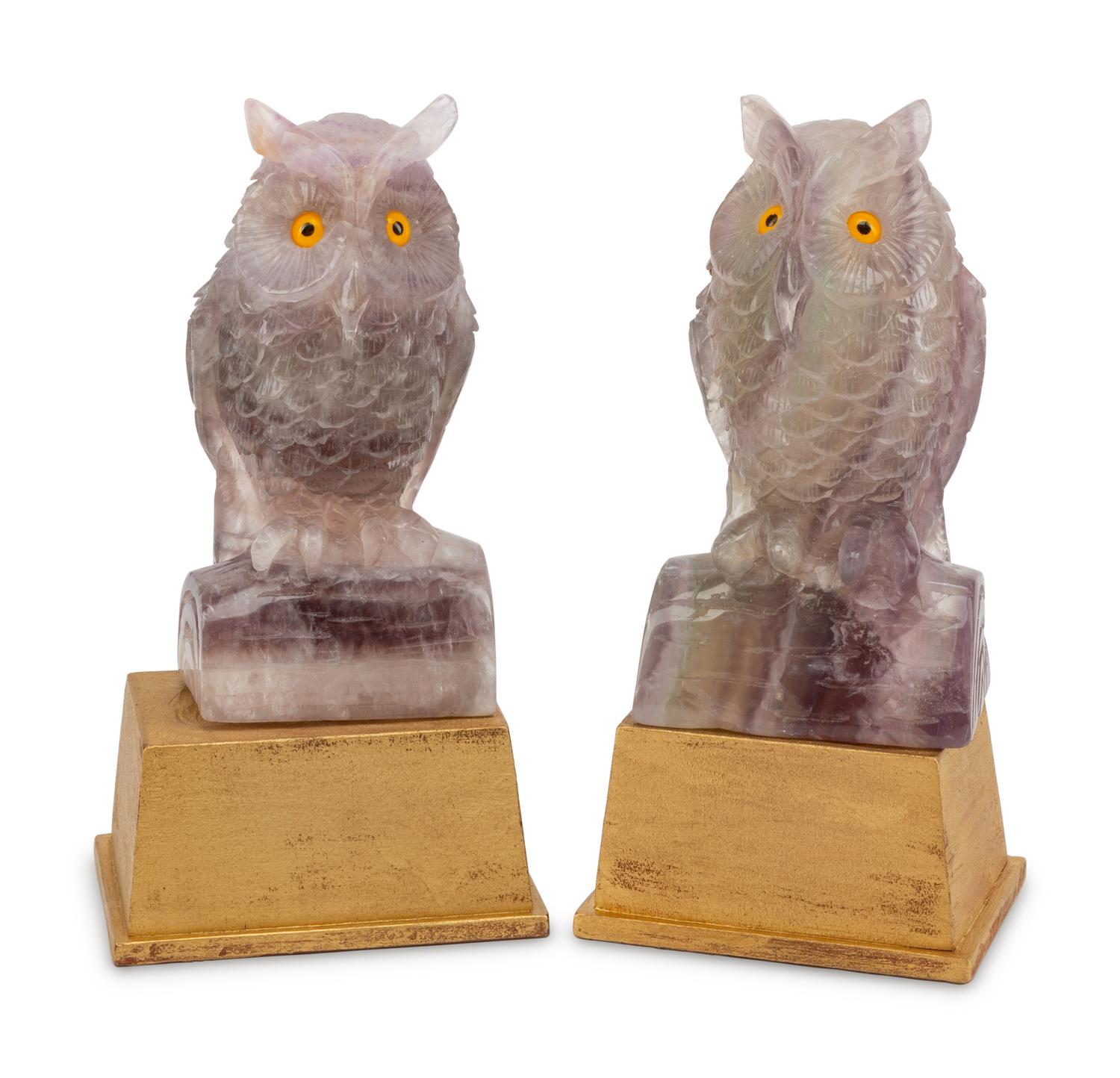 A Pair of Carved Amethyst Owls with Carved Wood Bases