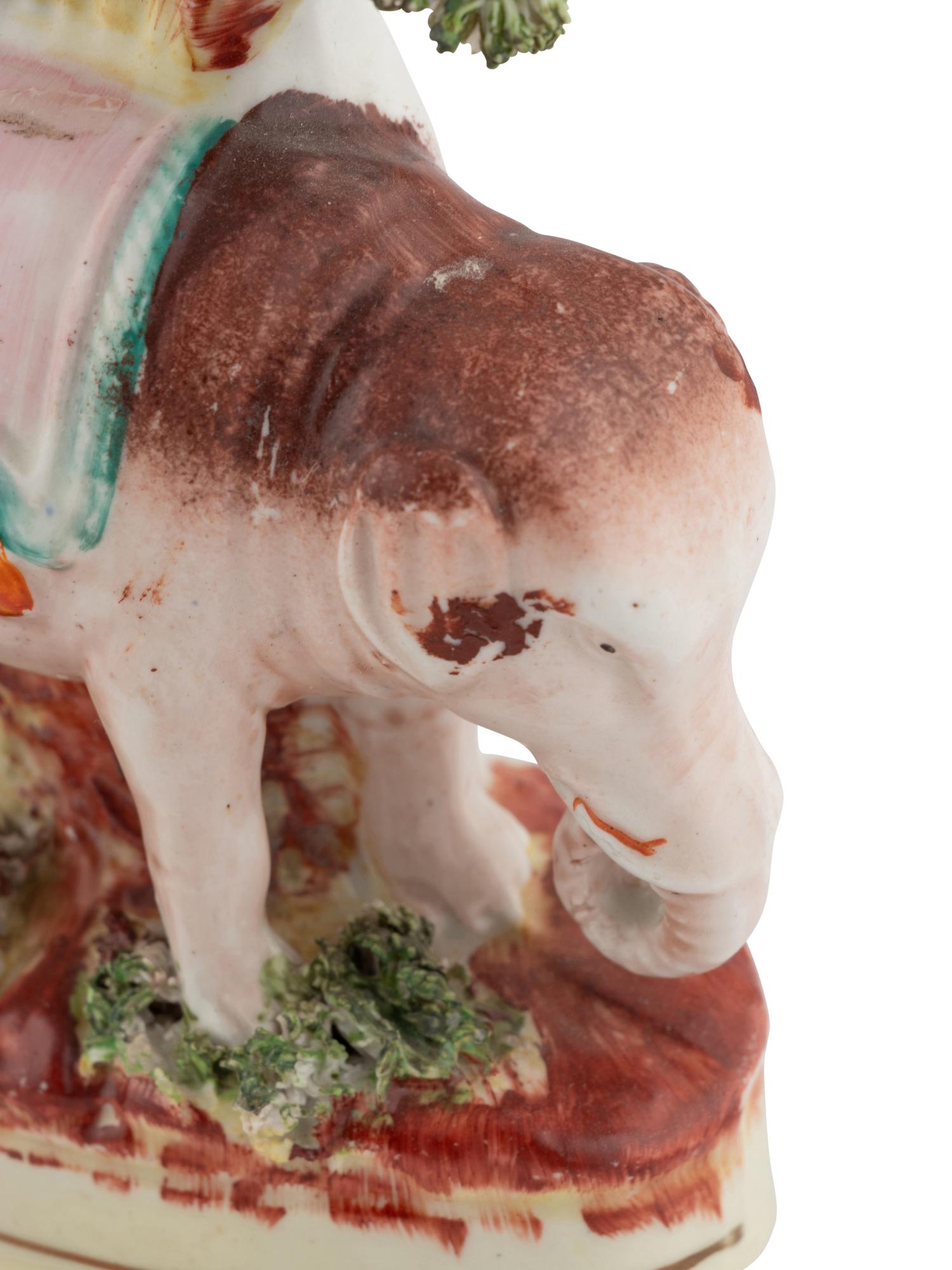 A Pair of Staffordshire Elephant-Form Spill Vases