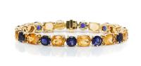 A 14 Karat Yellow Gold, Iolite and Citrine Line Bracelet, 21.1 dwts.