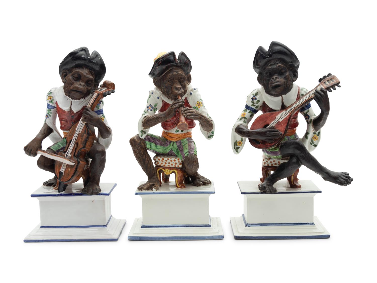 A Set of Three Italian Majolica Monkey Band Figures