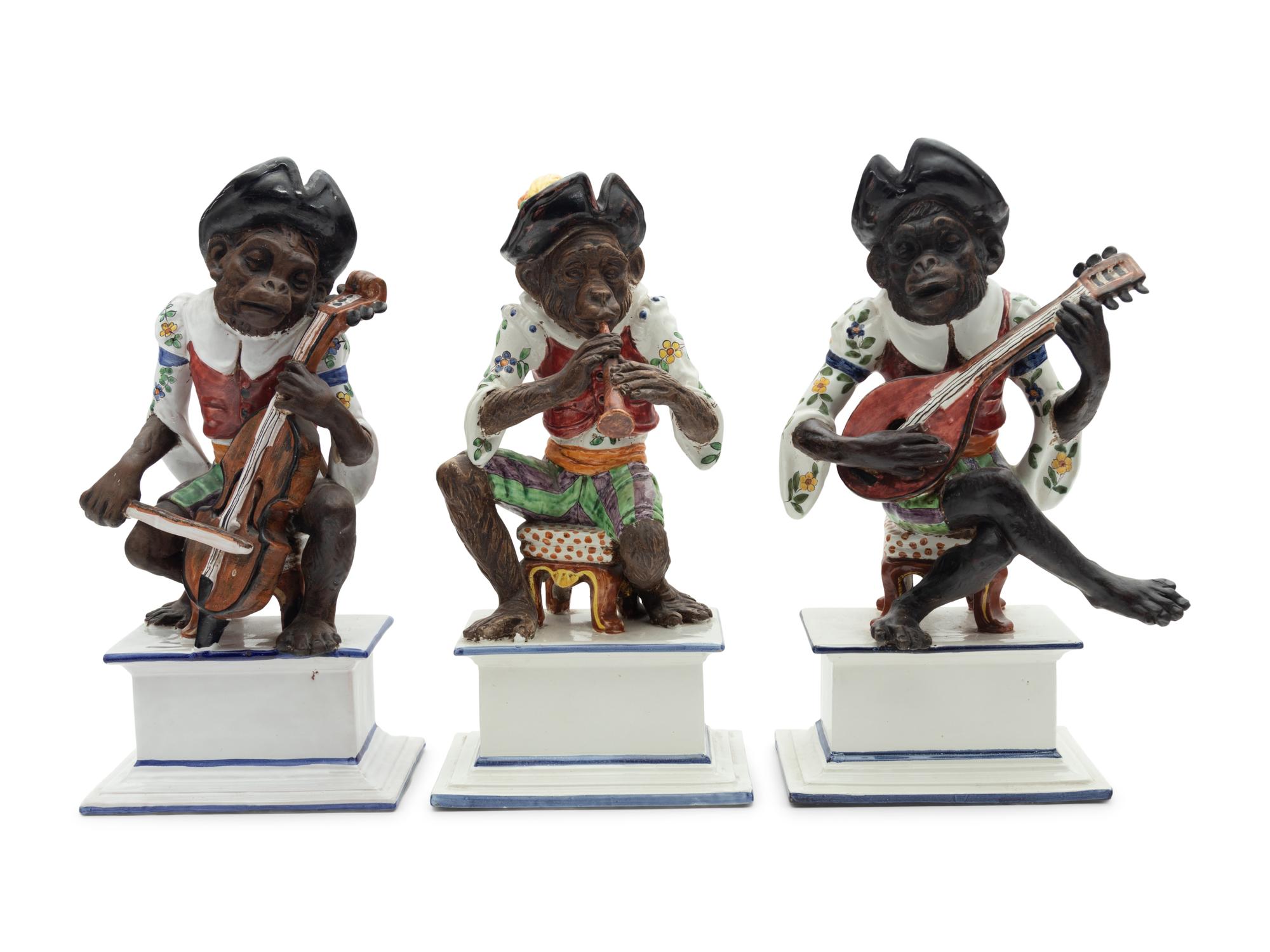 A Set of Three Italian Majolica Monkey Band Figures