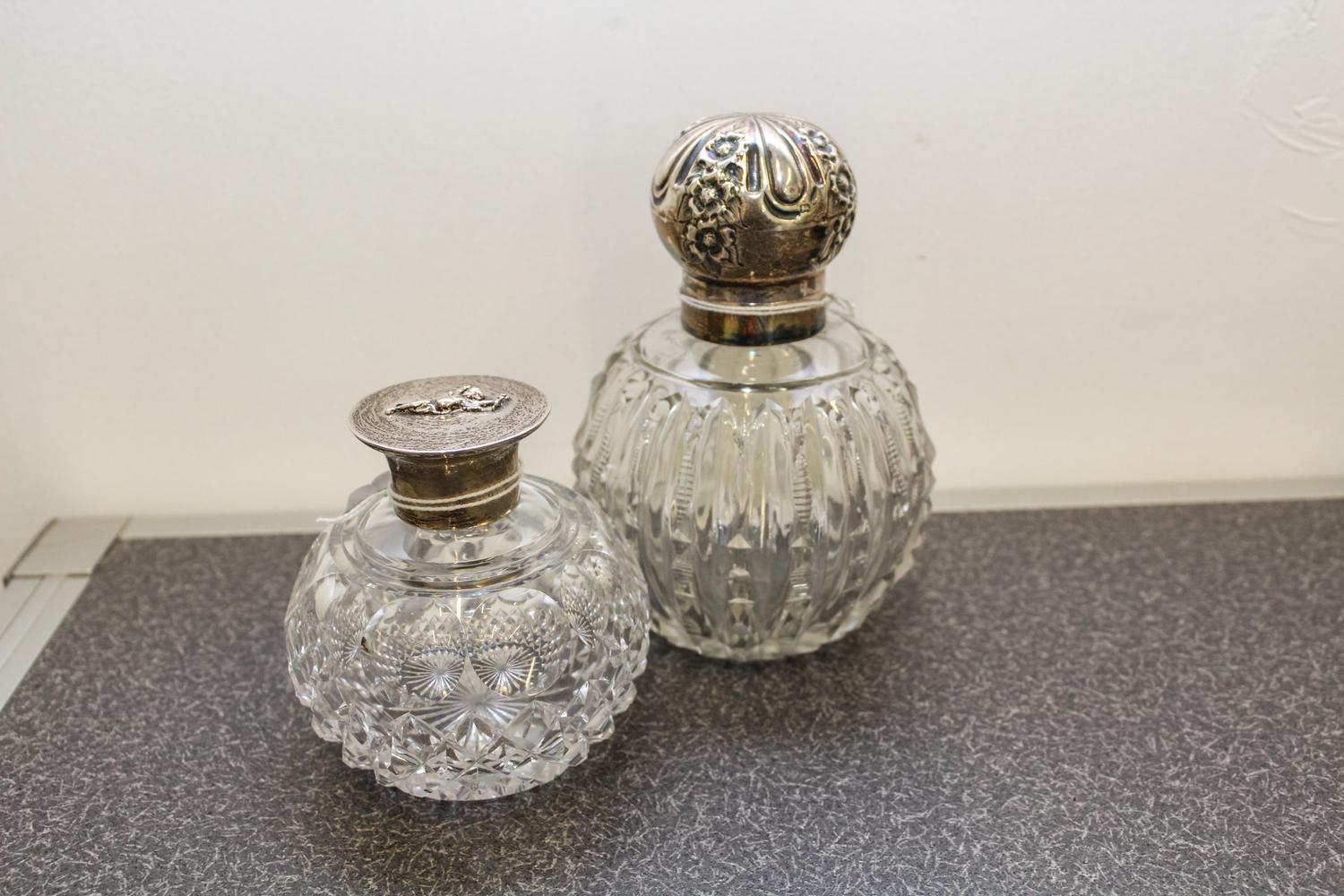 Two English Silver and Cut Glass Perfume Bottles, James Dixon & Sons, Sheffield, 1906 and John Grinsell & Sons, London, 1898, each havi