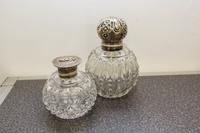 Two English Silver and Cut Glass Perfume Bottles, James Dixon & Sons, Sheffield, 1906 and John Grinsell & Sons, London, 1898, each havi