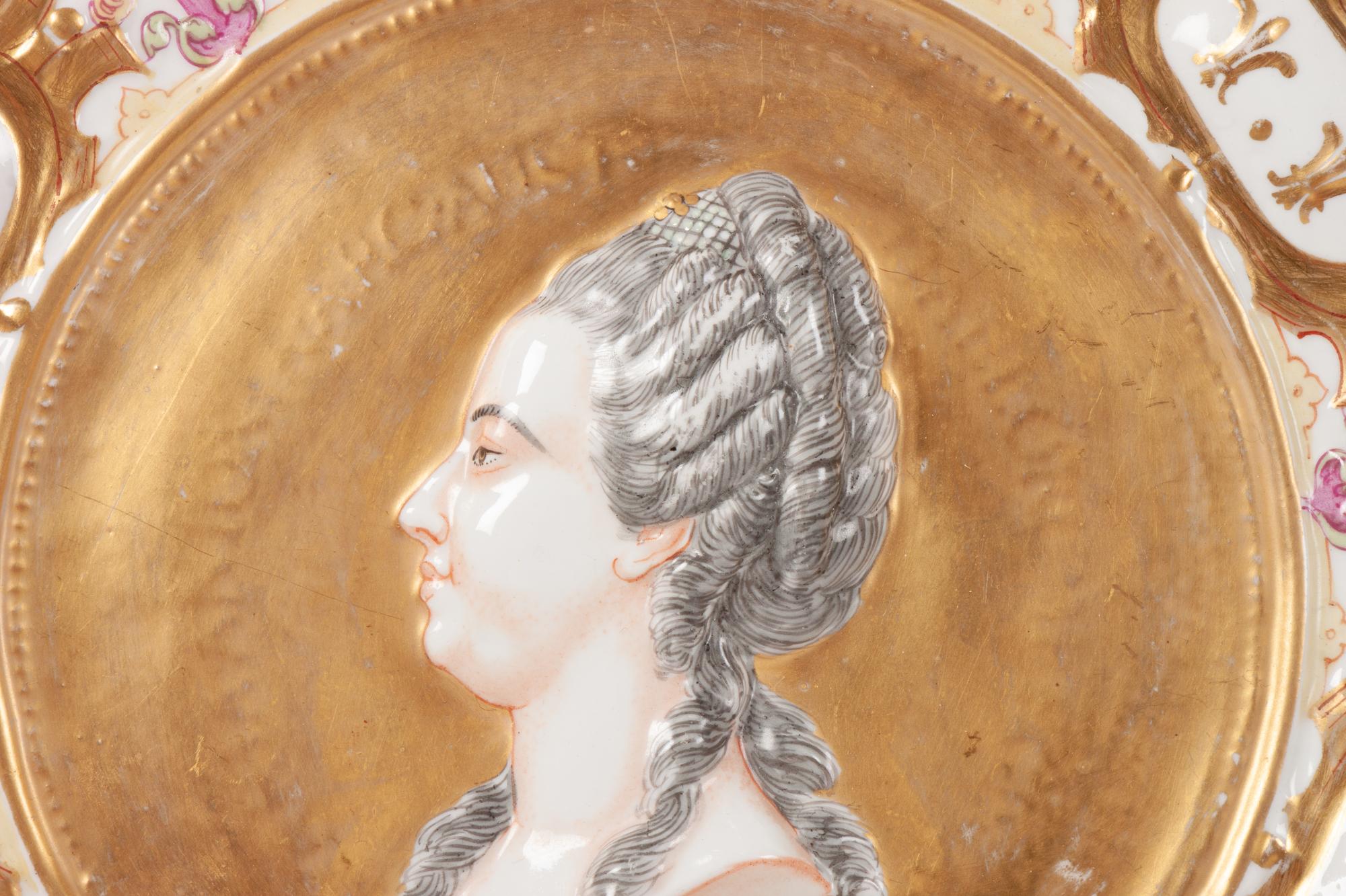 A Pair of Capodimonte Porcelain Relief Portrait Plates