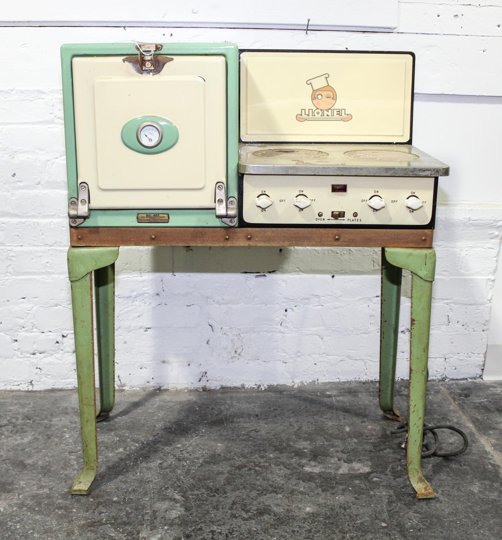 A Lionel Enameled Child's Stove Height 33 1/4 x width 26 x depth 12 /12 inches. — circa 1930's