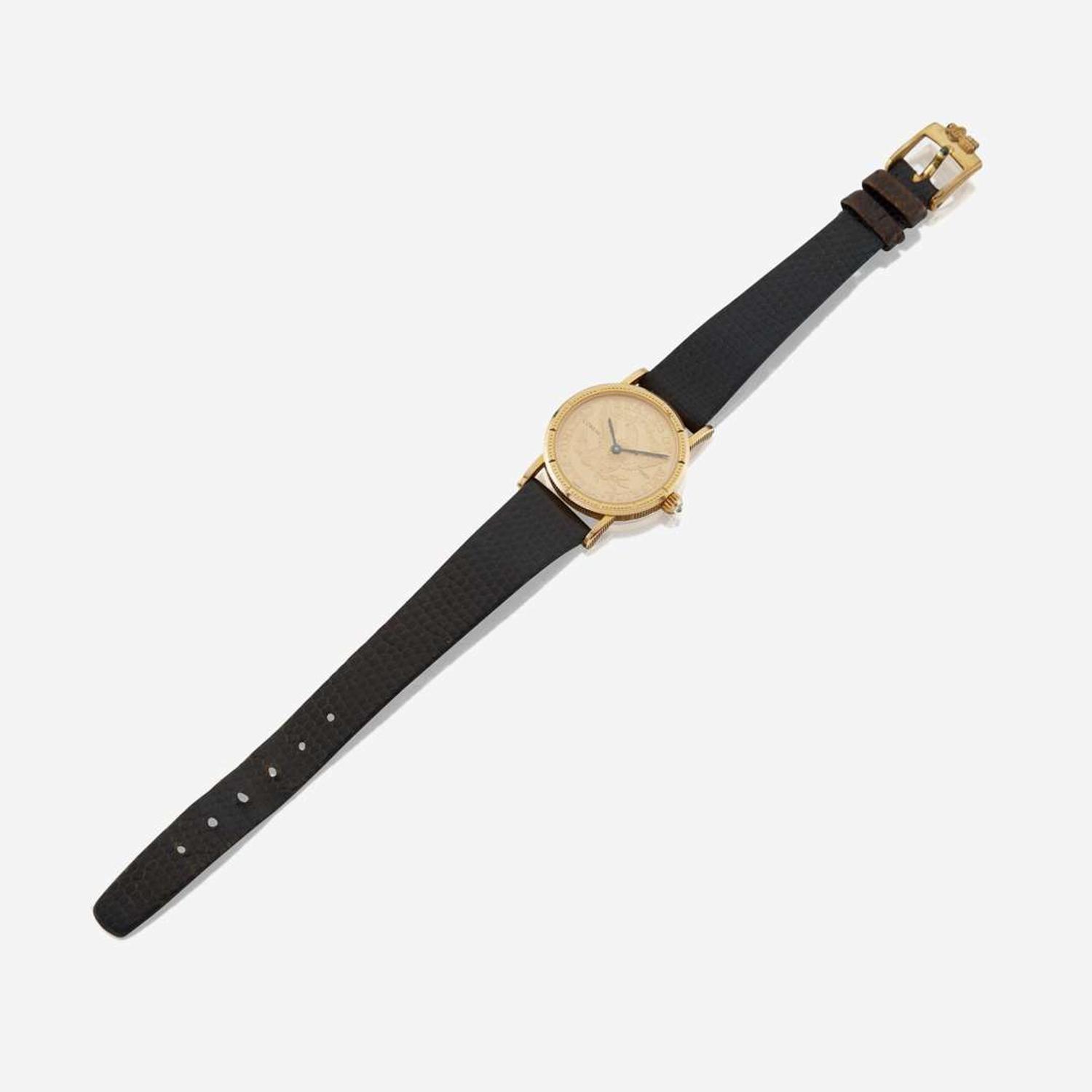 A gold coin wristwatch, Corum