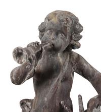 A Cast Lead Figural Group