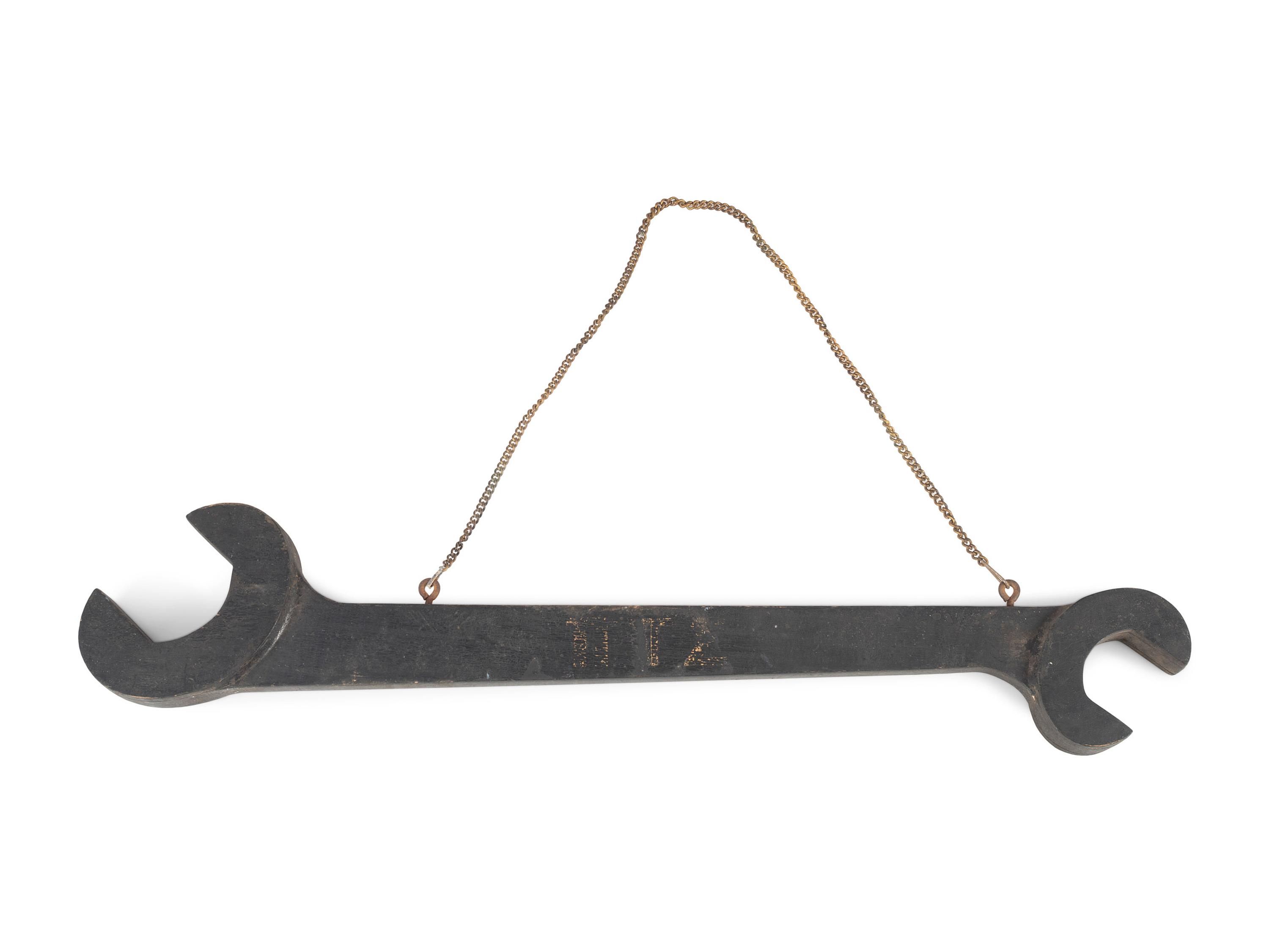 A Wrench-From Trade Sign and a Harness Maker Trade Sign