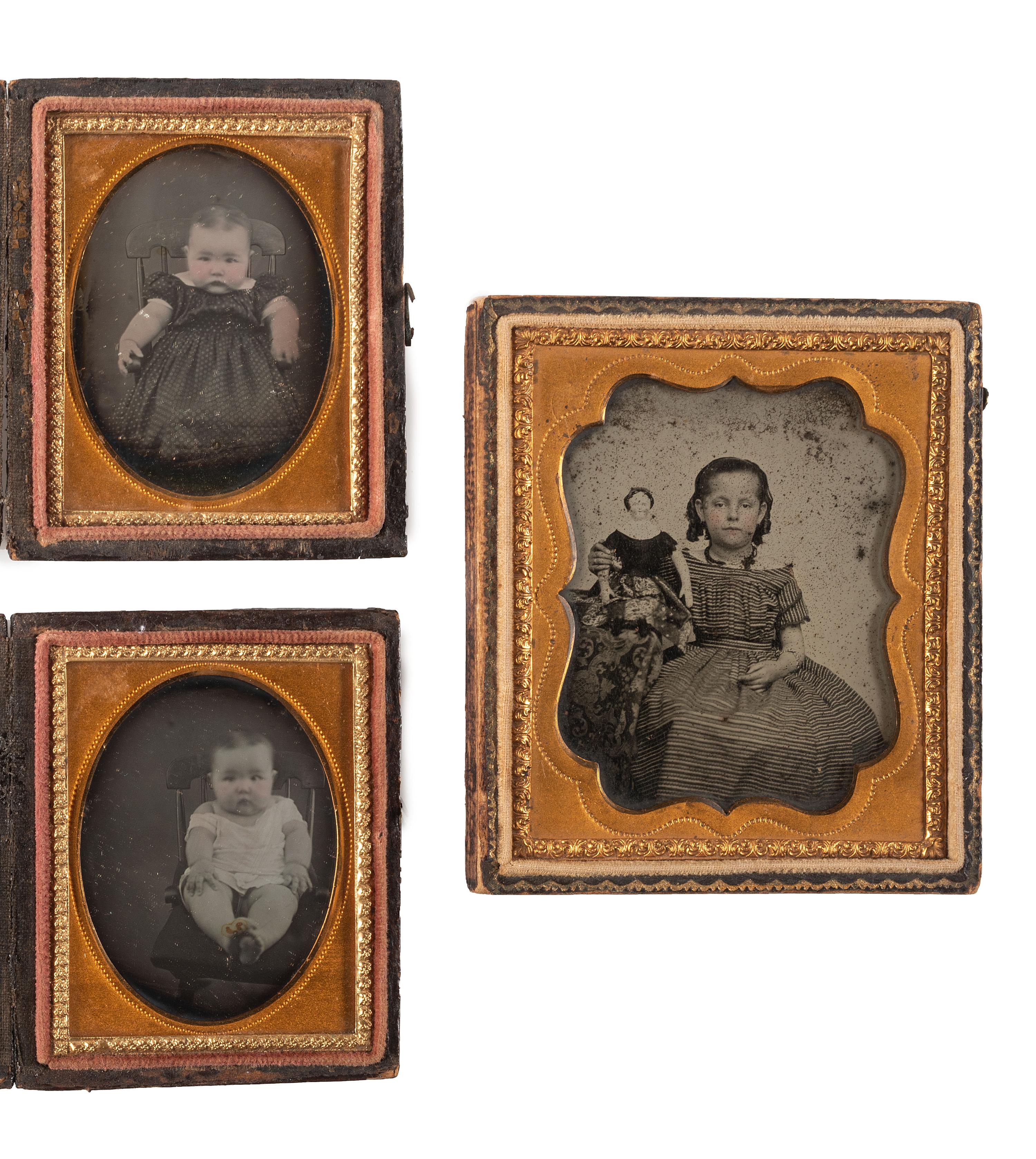 [EARLY PHOTOGRAPHY]. A group of 4 daguerreotype and ambrotype portraits of babies and children, highlighted by a fine daguerreotype featuring a mother and her child, comprising: