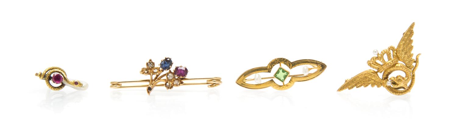A Collection of Yellow Gold and Multi Gem Pins, 6.90 dwts.