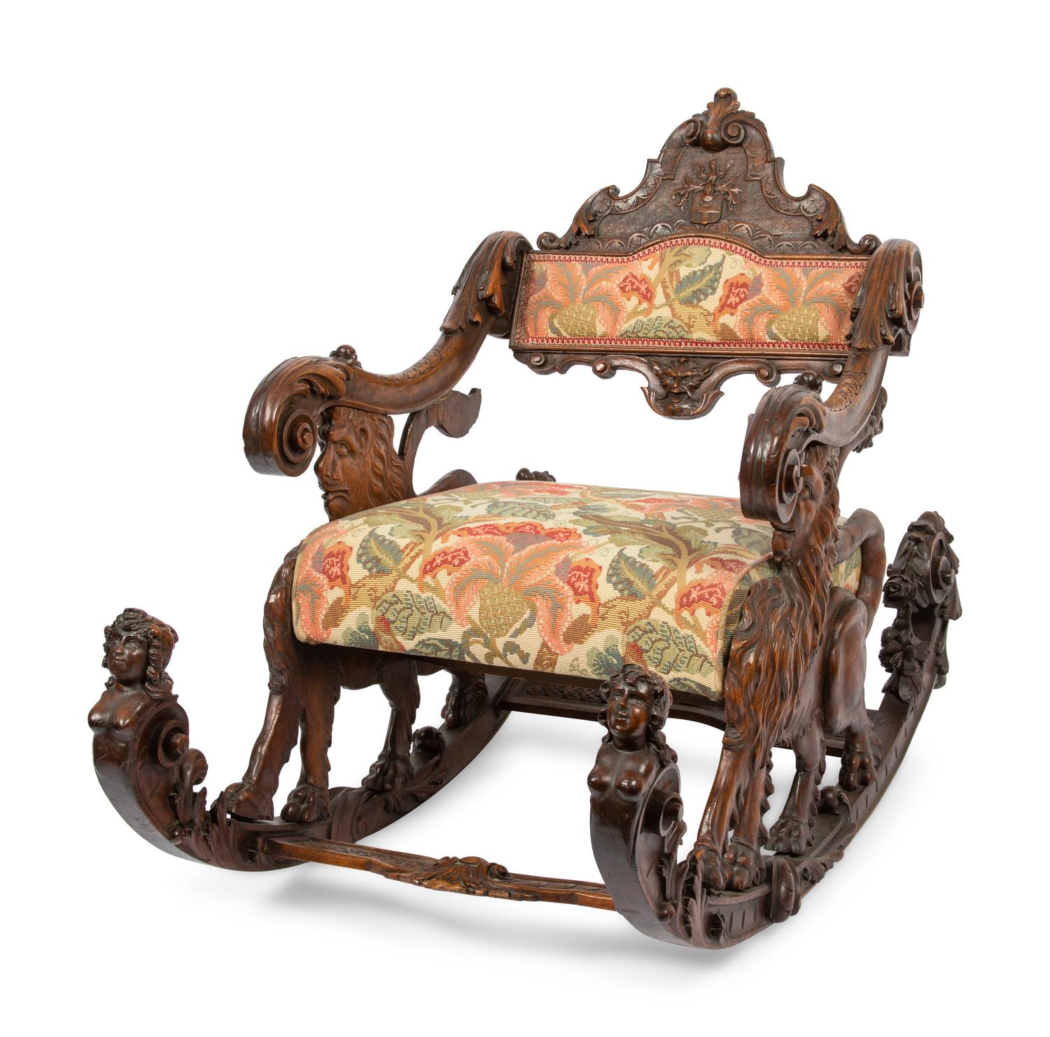 An Italian Carved Walnut Fantasy Rocking Chair