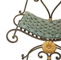 A Pair of Painted and Parcel Gilt Iron Curule Stools with Tufted Cushions