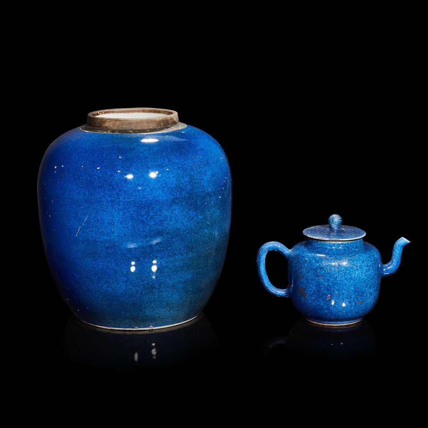 A Chinese powder-blue glazed teapot and cover and an ovoid jar 18th/19th century