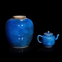 A Chinese powder-blue glazed teapot and cover and an ovoid jar 18th/19th century