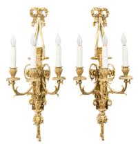 A Pair of Louis XVI Style Gilt Bronze Three-Light Sconces Length 27 inches. — LATE 20TH CENTURY