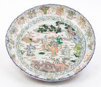 An Enameled Porcelain Charger Diameter 15 1/2 inches.