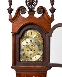 A Chippendale Carved and Figured Walnut Tall Case Clock