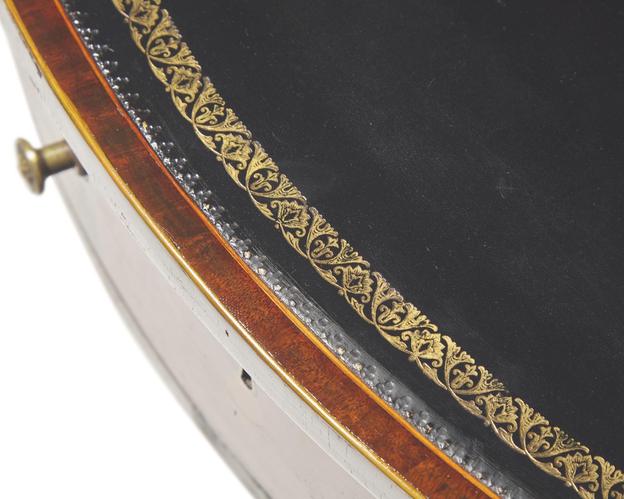 A Regency inlaid mahogany library center table, stamped "Willson London," circa 1820