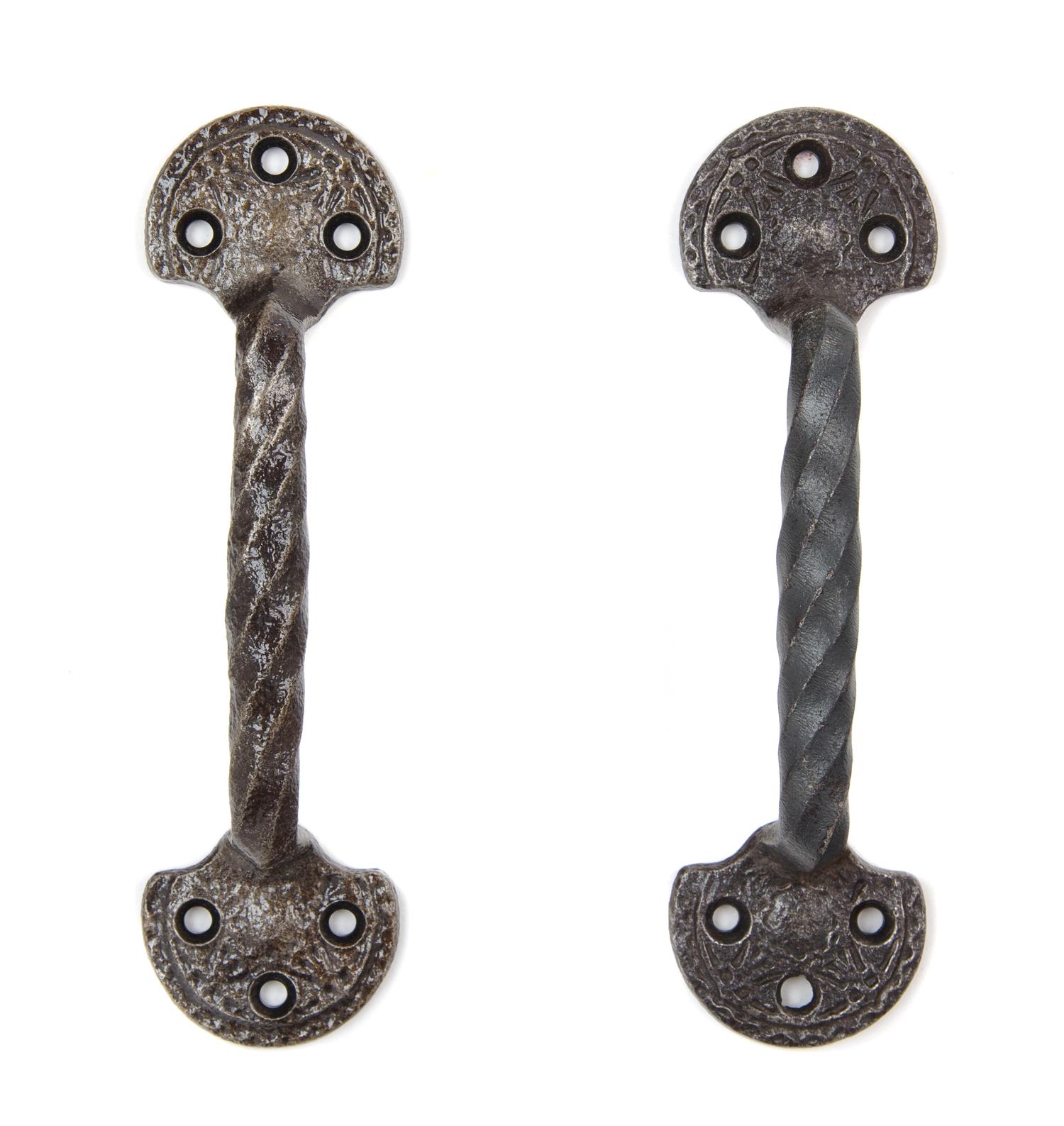 A Pair of Louis Sullivan Stock Exchange Window Pulls Height 7 1/2 inches. — CIRCA 1894