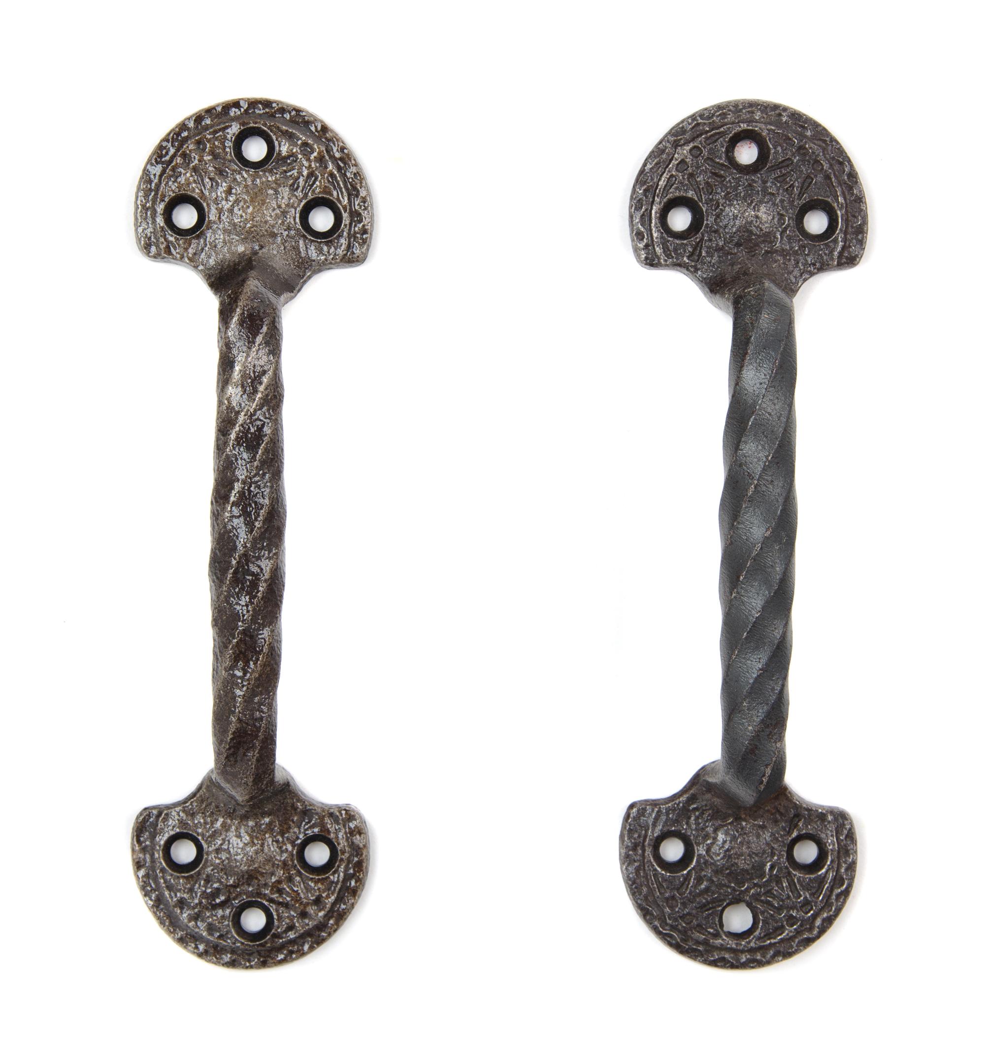 A Pair of Louis Sullivan Stock Exchange Window Pulls Height 7 1/2 inches. — CIRCA 1894