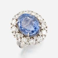 A sapphire, diamond, and white gold ring