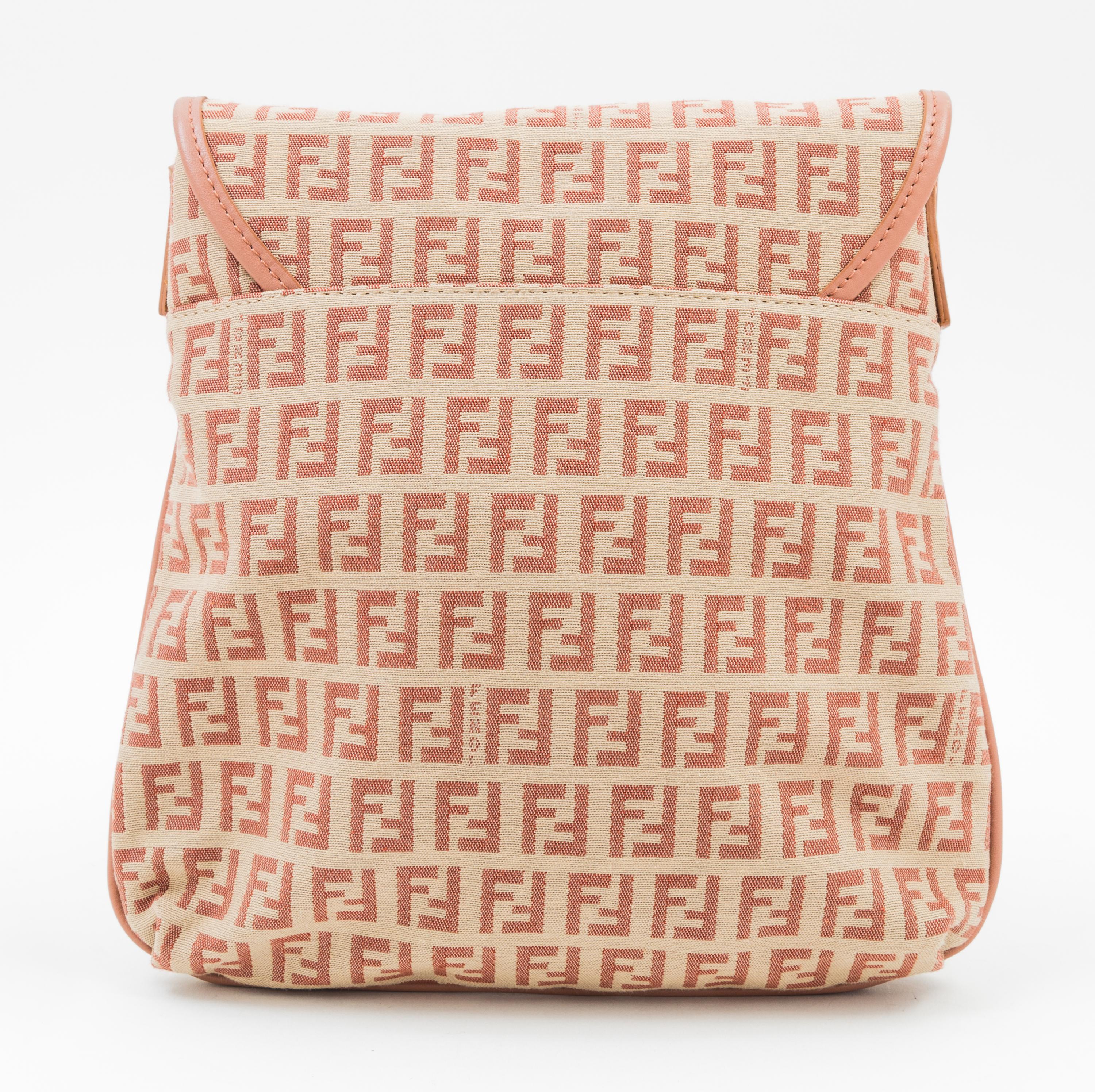 A Fendi Peach and Beige Monogram Canvas Cross Body Bag, 9" x 9" x. 5"; Strap drop: 20".