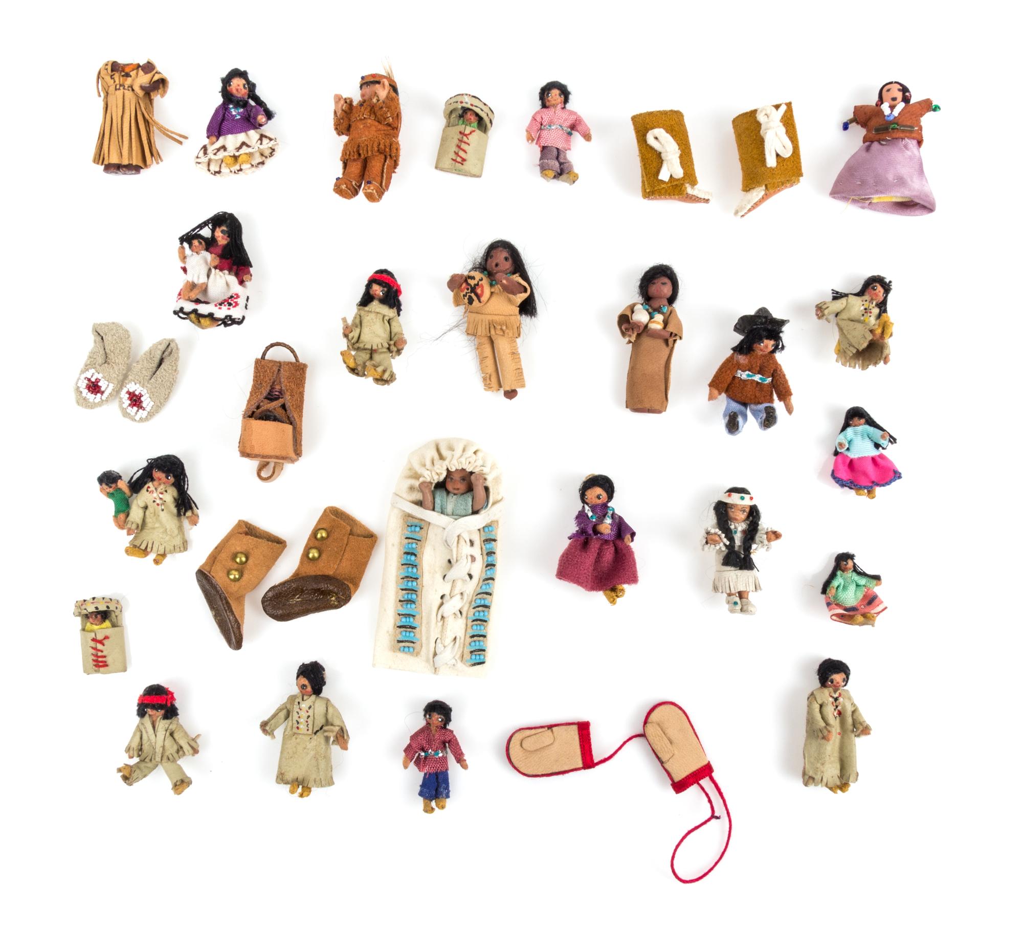 A Collection of Native American Dolls Length of longest 2 5/8 inches. — Various Makers