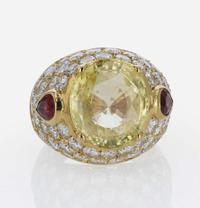 An 18K Yellow Gold and Gemstone Ring