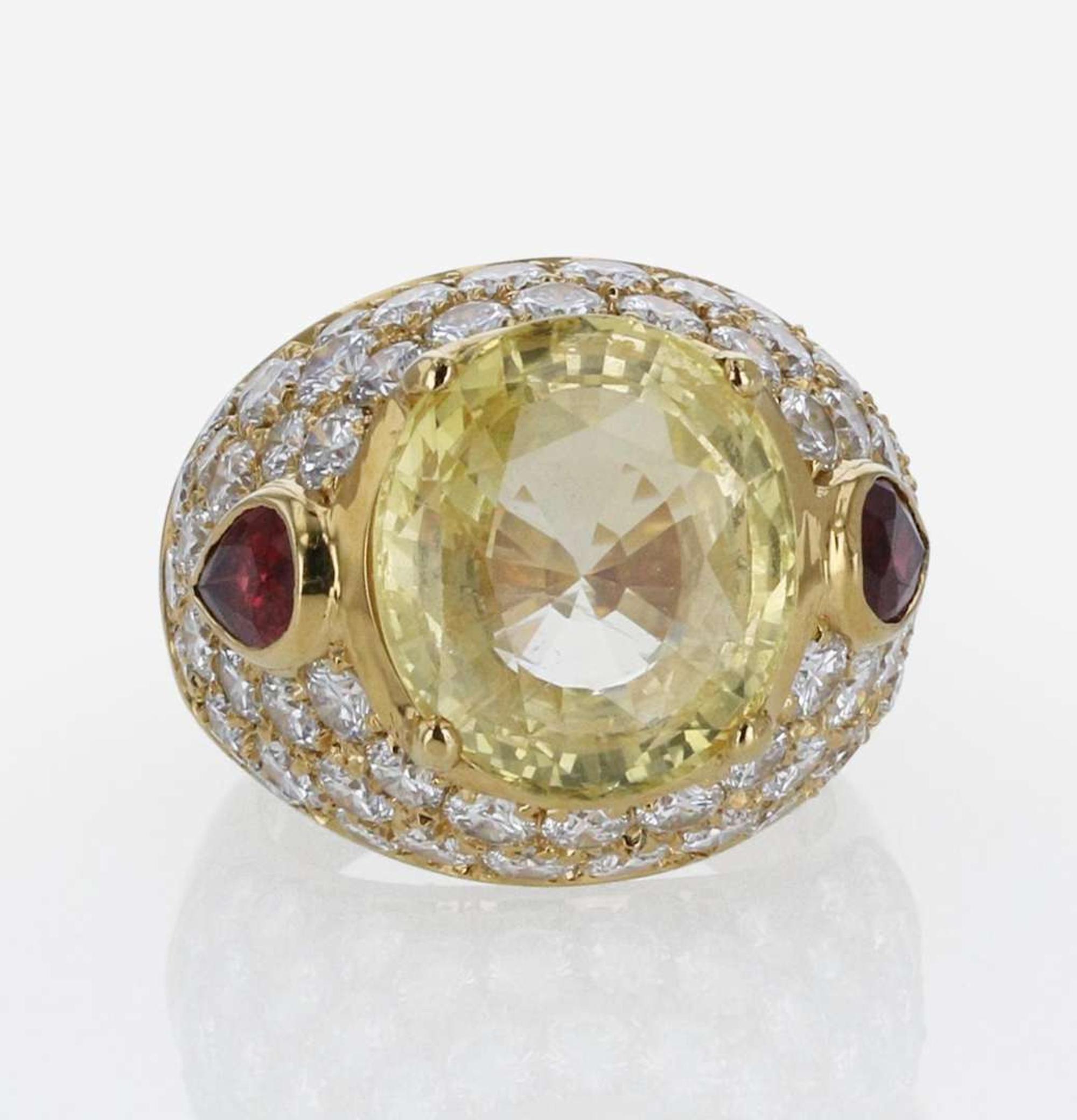 An 18K Yellow Gold and Gemstone Ring