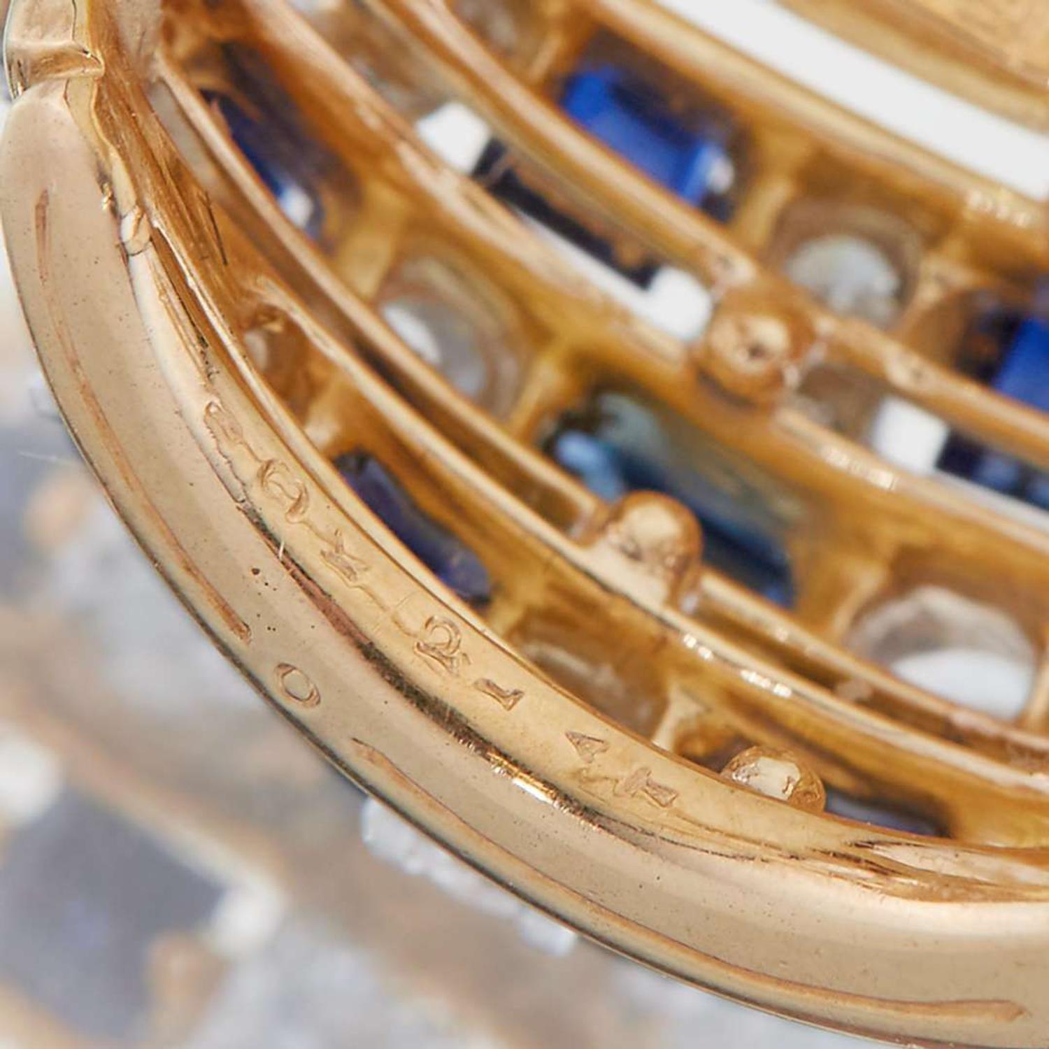 A pair of sapphire, diamond, eighteen karat gold, and platinum earrings, Oscar Heyman