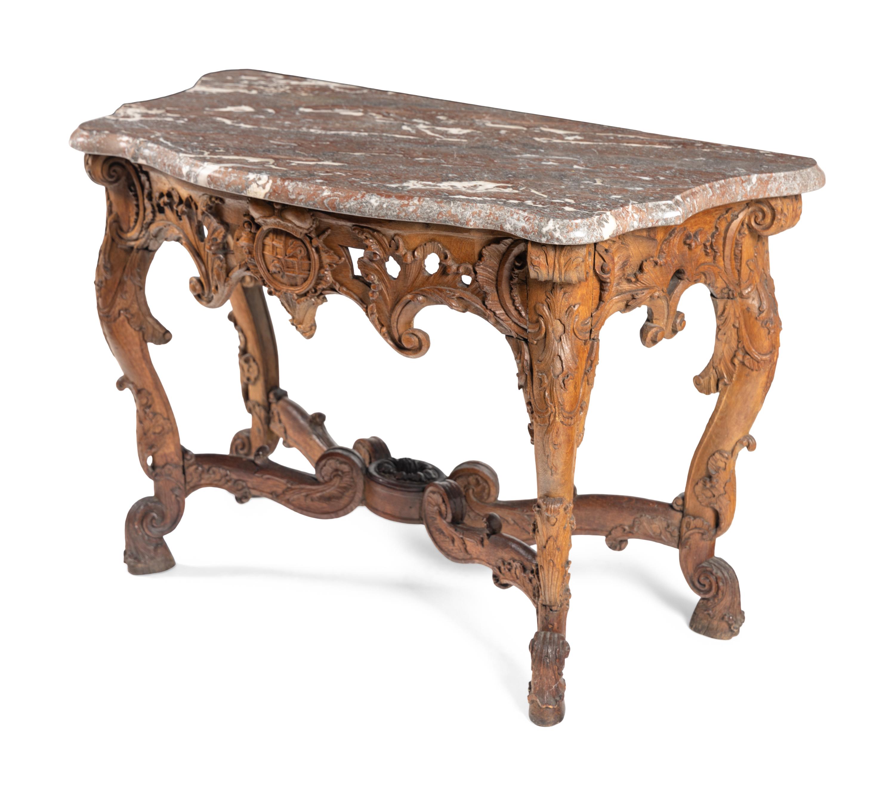 A Pair of Régence Carved Oak Marble-Top Console Tables