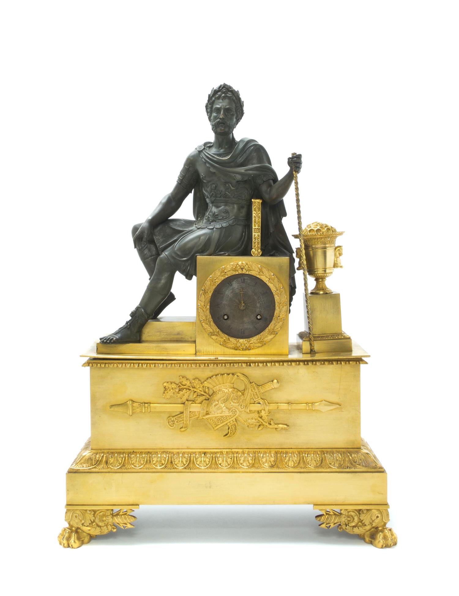 An Empire Gilt and Patinated Bronze Figural Mantel Clock, Height 22 3/8 inches.
