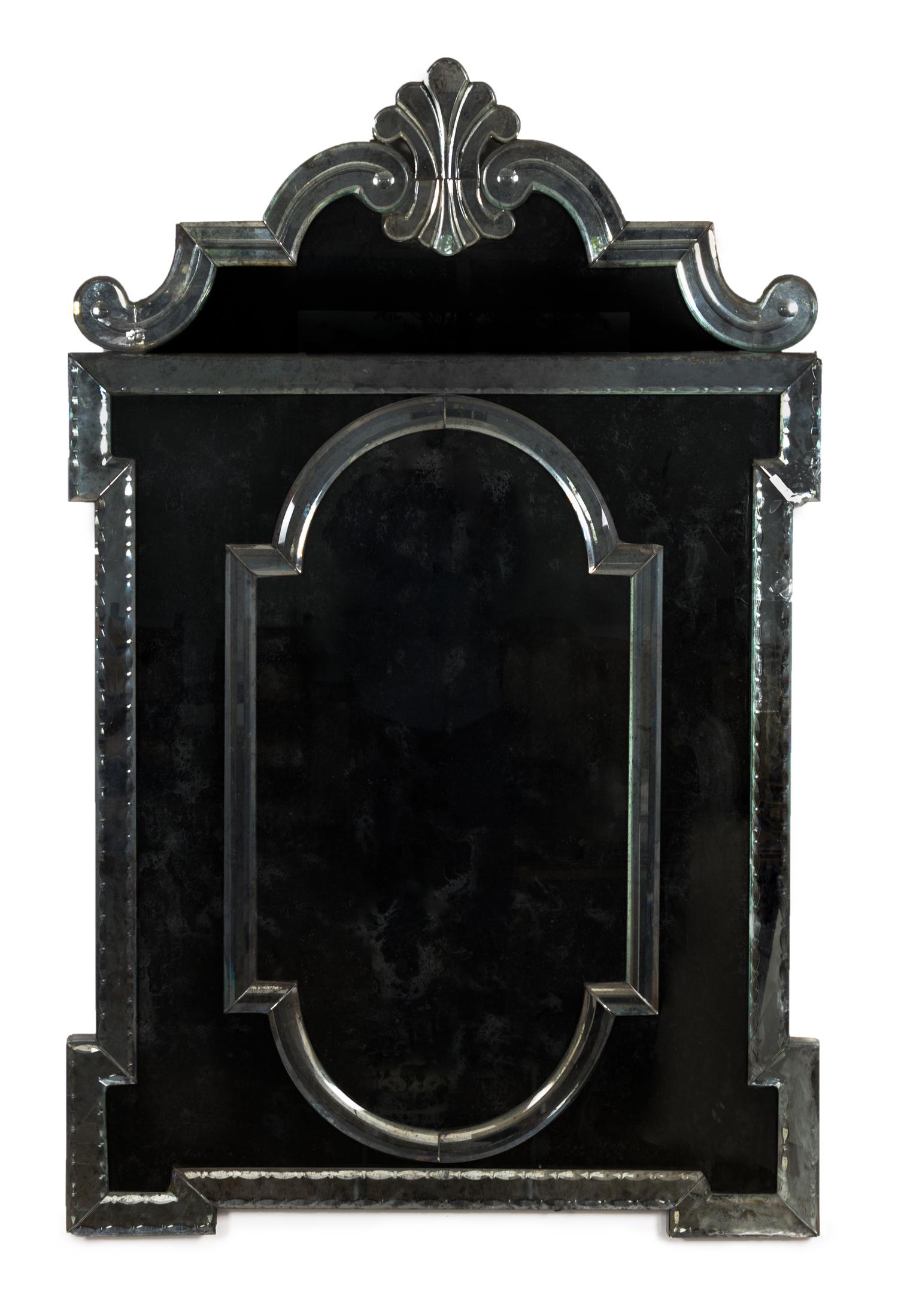 A Pair of Venetian Glass Mirrors Height 56 1/2 x width 36 1/2 inches.