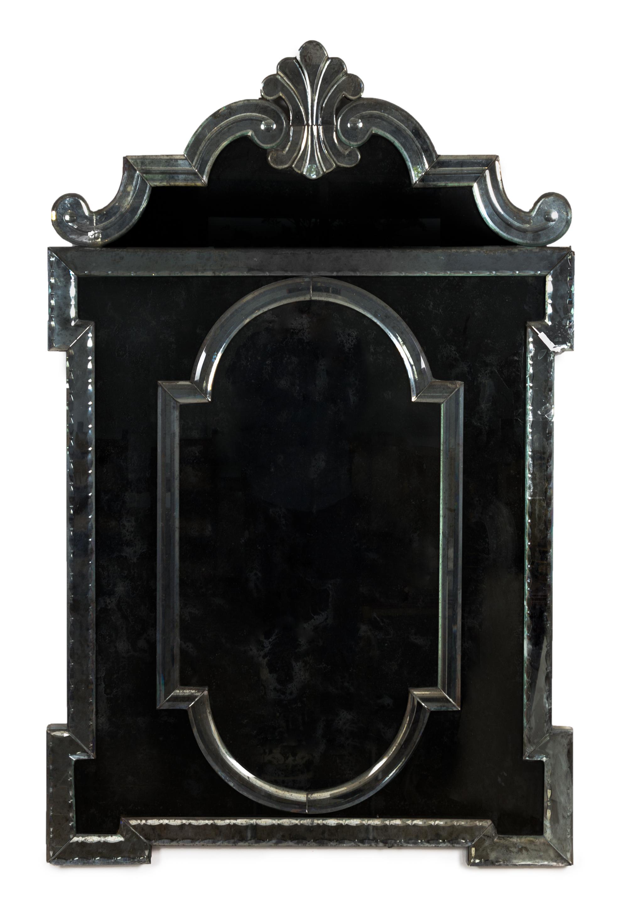 A Pair of Venetian Glass Mirrors Height 56 1/2 x width 36 1/2 inches.