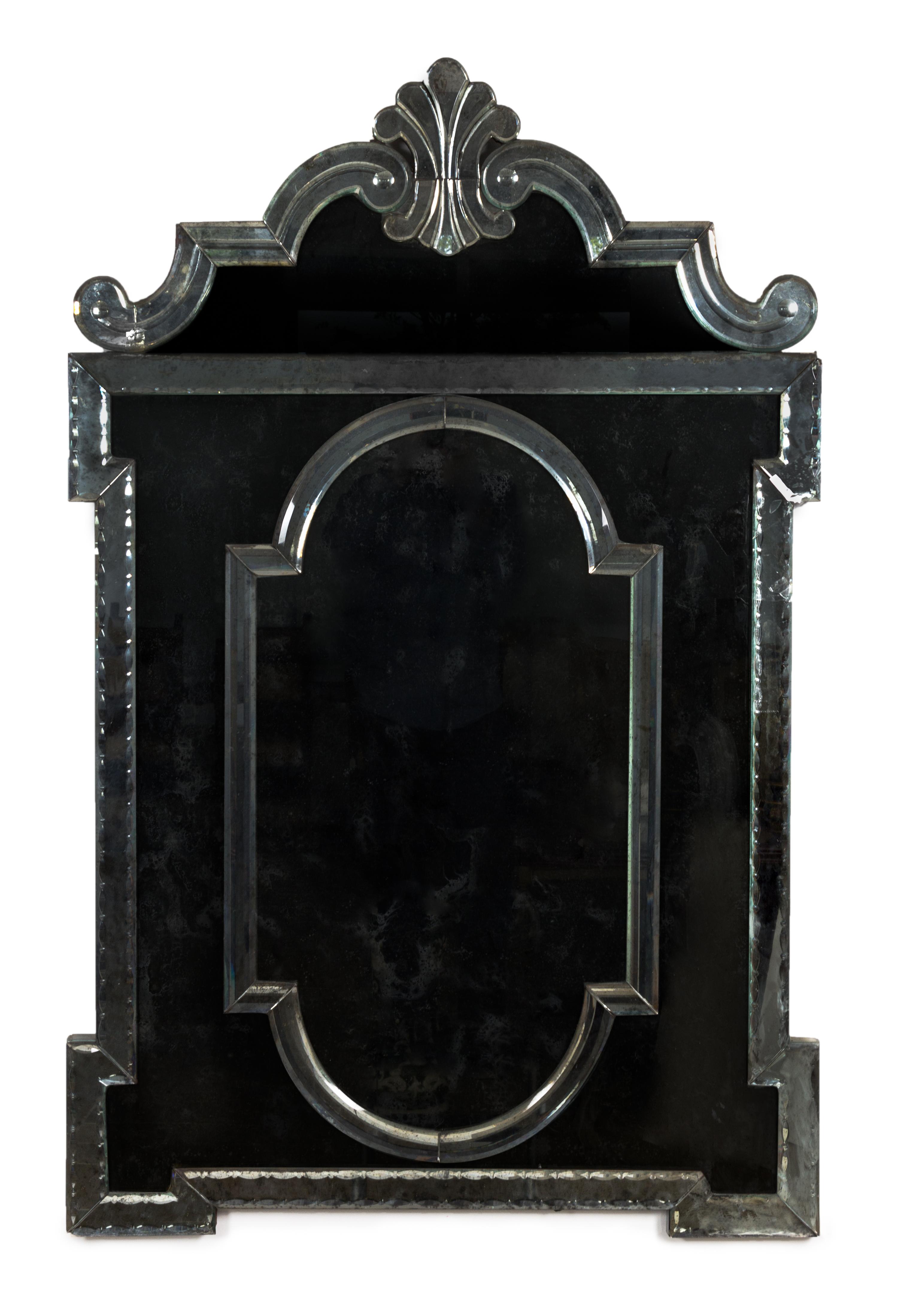A Pair of Venetian Glass Mirrors Height 56 1/2 x width 36 1/2 inches.